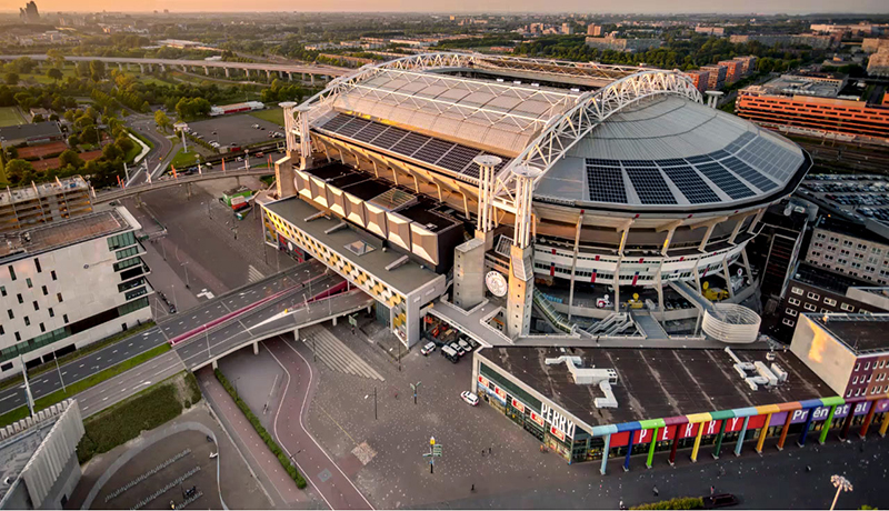 Amsterdam Arena, home to football team Ajax, complete with rooftop solar PV now houses 4MW of battery storage from Eaton-Nissan, controlled by Mobility House. Image: Mobility House.
